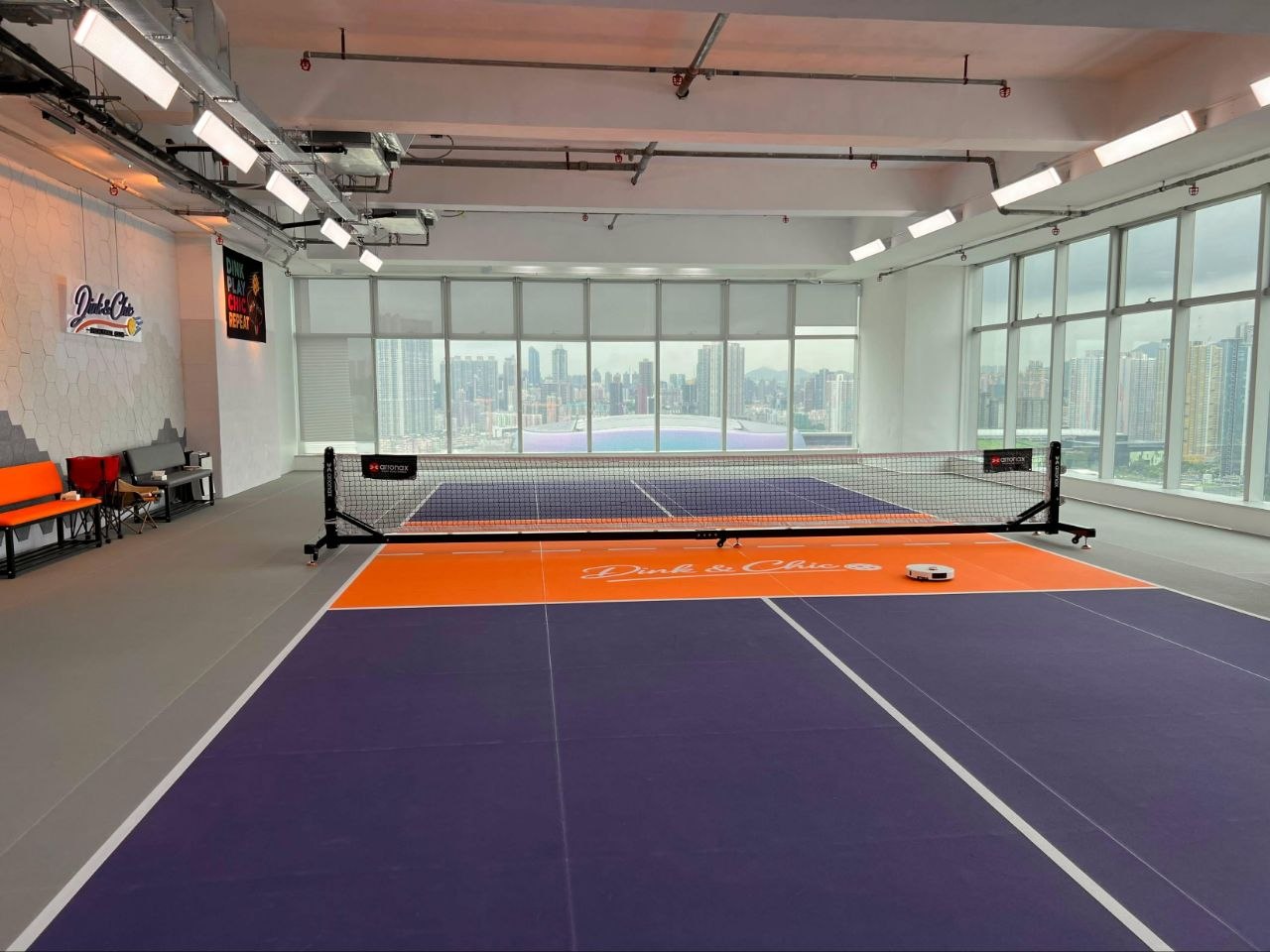 Full court from the baseline, Kai Tak Sports Park through the windows