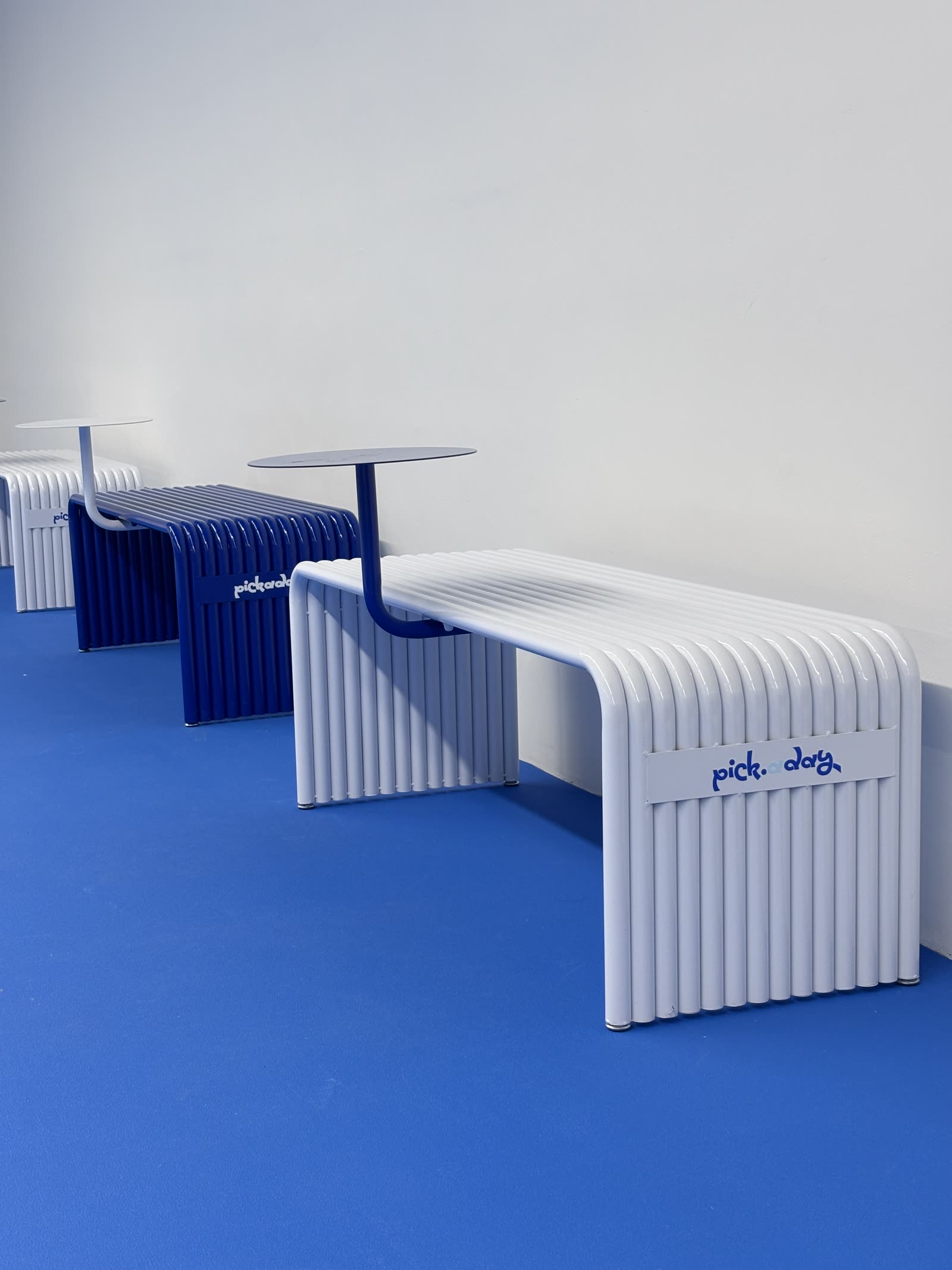Courtside benches and tables
