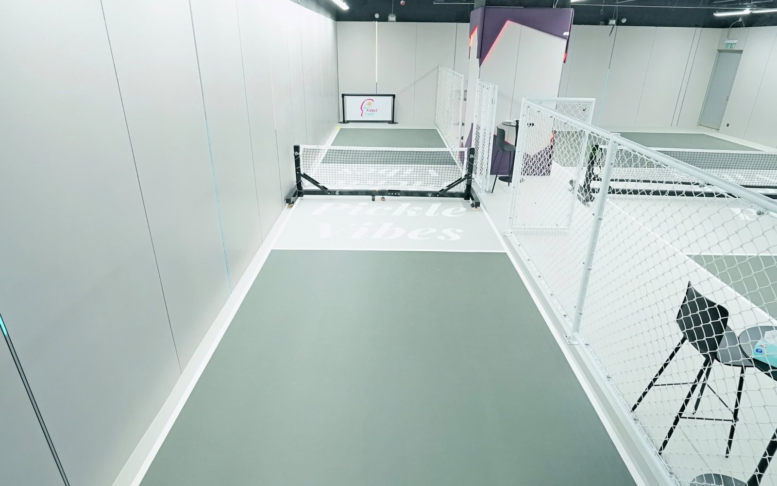 Fenced training lanes for drills and the ball machine