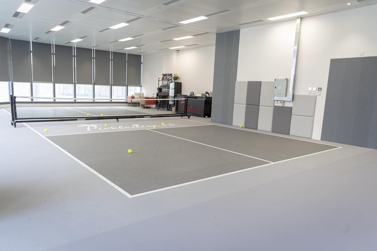 Grey court, paddle pro-shop and reception behind