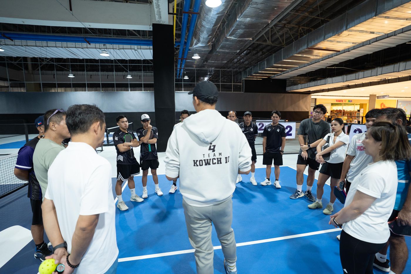 Bobby briefing players before a Kowch IQ session
